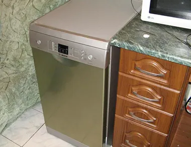 Mosógép a konyhában, hogyan kell telepíteni vagy integrálódni egy kis Hruscsov
