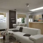 Interiorul dispune de o cameră de bucătărie-living combinat, fotografii posibile opțiuni de design