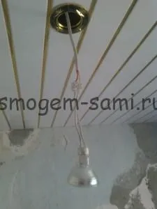 Инсталиране на прожектори в PVC панели на тавана, направете smogom