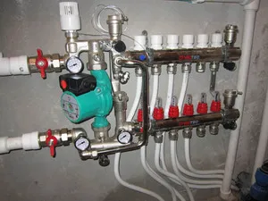 Cum de a face colector pentru încălzirea prin pardoseală cu propriile lor mâini, în special de selecție, de asamblare și de conectare