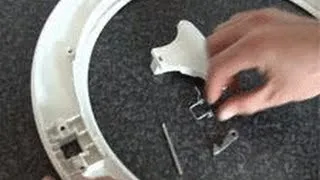 Fragmentat mașină de spălat de înlocuire buton și repararea ușii trapa cu propriile sale mâini!