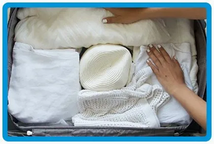 Cum de a transporta o pălărie cu câmpuri mari într-o valiza pe care ea a ezitat