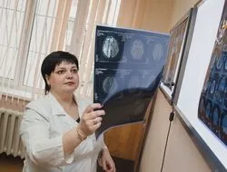 MRI за хора с наднормено тегло отворени върху гръбначния стълб и малък таз