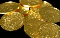 Vásárlás aranyrúd érméket a vállalat teljesítmény