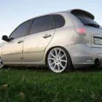 Tuning faruri G15 Nissan Almera, grila radiatorului cu mâinile lor