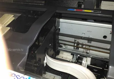 Înlocuirea capului de imprimare pe tx410 MFP Epson