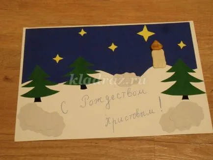 Card înainte de Crăciun cu mâinile