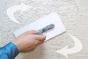 Как да украсят фасадата с декоративна мазилка 