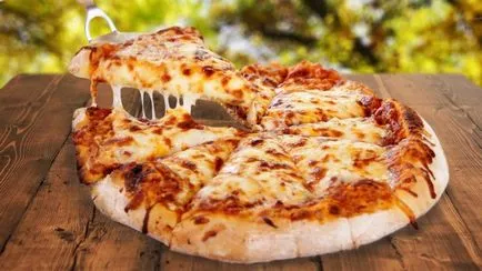 Pizza aszalt paradicsommal és sajttal recept négy képpel, nagy szakács