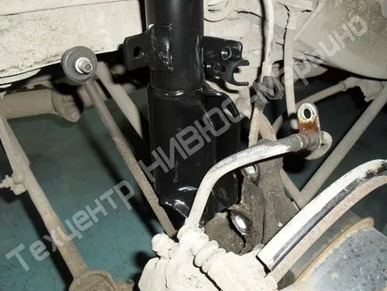Înlocuirea amortizoarele din spate pe o masina Toyota Camry