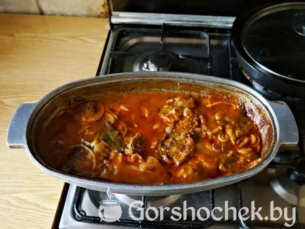 Carp înăbușită în sos de tomate (foto)