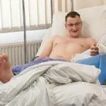 як лікувати розтягнення спини