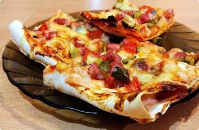 Cum să gătești pizza pita într-o tigaie acasă