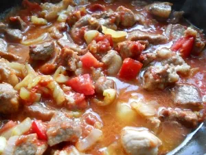 Porc cu ardei gras și tomate (tomate capsicum) Carne de porc cu ardei gras și roșii