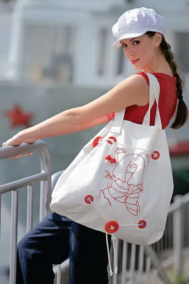 saci de plajă cu mâinile lor și un atelier de fotografie „coase un sac de plajă cu mâinile“ (lui) saci de plajă cu mâinile lor și un atelier de fotografie „coase un sac de plajă cu mâinile“