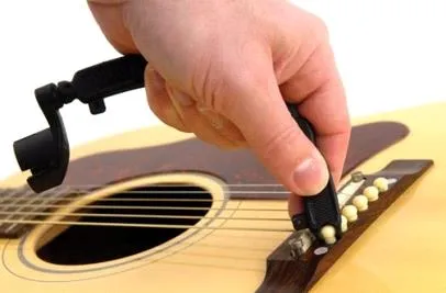 Cum pot schimba corzile pe o chitara, melodii, acorduri, file, compilare