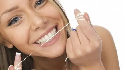 Ca folosirea atei dentare - igiena orala, reziduuri de la gume alimentare de curățare (cavitate) Cum se folosește ața dentară - igienă orală, curățarea gingiilor din reziduurile alimentare