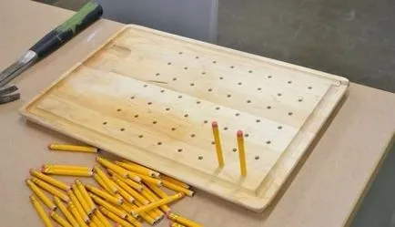 Designer de moda cu mâinile Drainboard, organizator, lucrurile lui utile, o clasă de master,