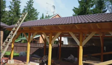 Cum de a construi un șopron la casa fara a cheltui prea mult timp și bani