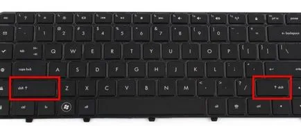 Cum de a pune semne de punctuație pe o tastatură laptop