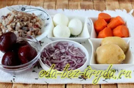 Cum de a decora un hering sub o haină de blană fotografie