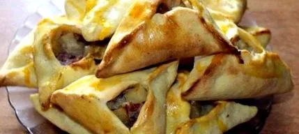 како