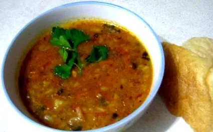 како
