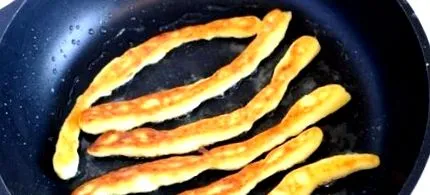 како