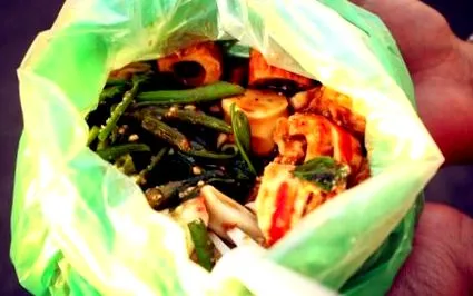 како
