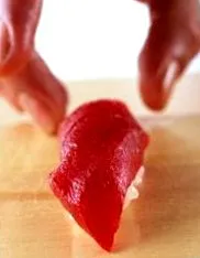 како
