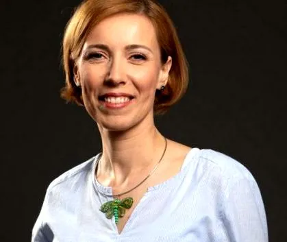 amiért