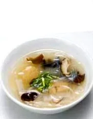 како