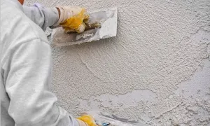 A homlokzati vakolat szú fotó homlokzat magánházak és a technológia, hogy felhívja a dekoratív kompozíció