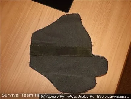 A tartóban a fegyver, a kezüket (varrni Cabourg) A tartóban a pisztoly saját kezűleg