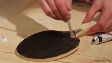 Pingpongütőt kezük