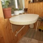 Összecsukható asztal kezével Összecsukható asztal kezével