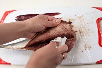 Hogyan lehet csökkenteni a hering - egy recept lépésről lépésre fotók