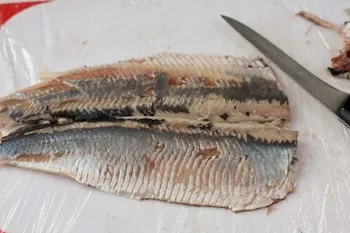 Hogyan lehet csökkenteni a hering - egy recept lépésről lépésre fotók