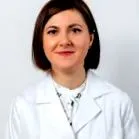 žena