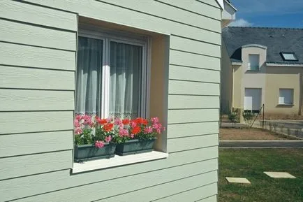 Cum de a decora fațada unei case din lemn