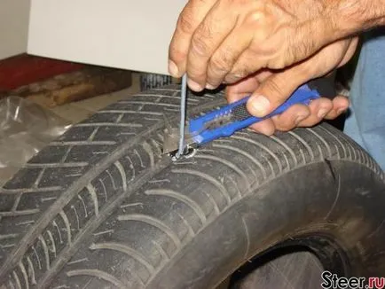 repararea anvelopelor mâini propria lor puncție, partea taiata