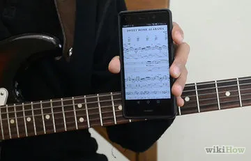 Cum să tune chitara fără un tuner (inferior sursa de sunet) Cum să tune chitara ta, fără un tuner