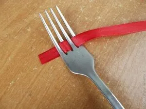 arcuri duble miniatură pe o furcă (arcuri) arcuri duble miniatură pe o furculiță