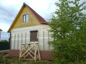 Cărămidă casa de lemn decât în ​​teacă casa de lemn din exterior, materialele pentru piele exterioară la domiciliu
