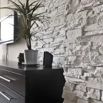 Decorarea peretilor cu piatra decorativa în camera de zi apartament cu care se confruntă un material artificial (fotografii, (pereții) Decorarea pereților cu piatră decorativă în camera de zi apartament cu care se confruntă un material artificial (fotografii,