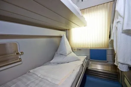 Vagon de lux în interior - compartiment foto pe căile ferate de tren arata ca un loc de lux, precum și numărul trenului trenului (coupe) Vagon de lux în interior - compartiment foto pe căile ferate de tren arata ca un loc de lux, precum și numărul trenului de cale ferată