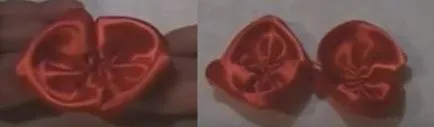 Florile din panglici cu mâinile lor