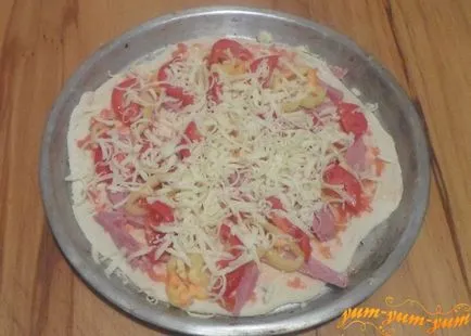 Rețetă pentru pizza de casa cu șuncă, brânză și roșii (reteta) Rețetă pentru pizza de casa cu șuncă, brânză și roșii