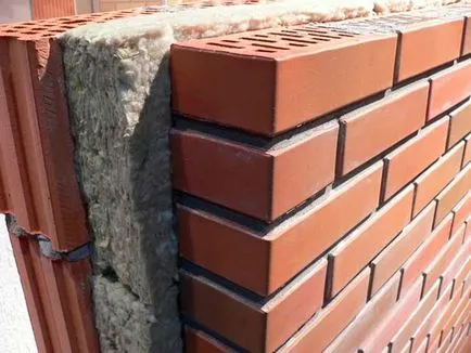 Izolarea termică a unei case de caramida cu mâinile în interiorul ieftin (mâini) Încălzirea mâinile ei în interiorul casei sale de caramida ieftin