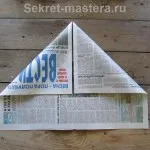 Capacul de ziar cu un vizor